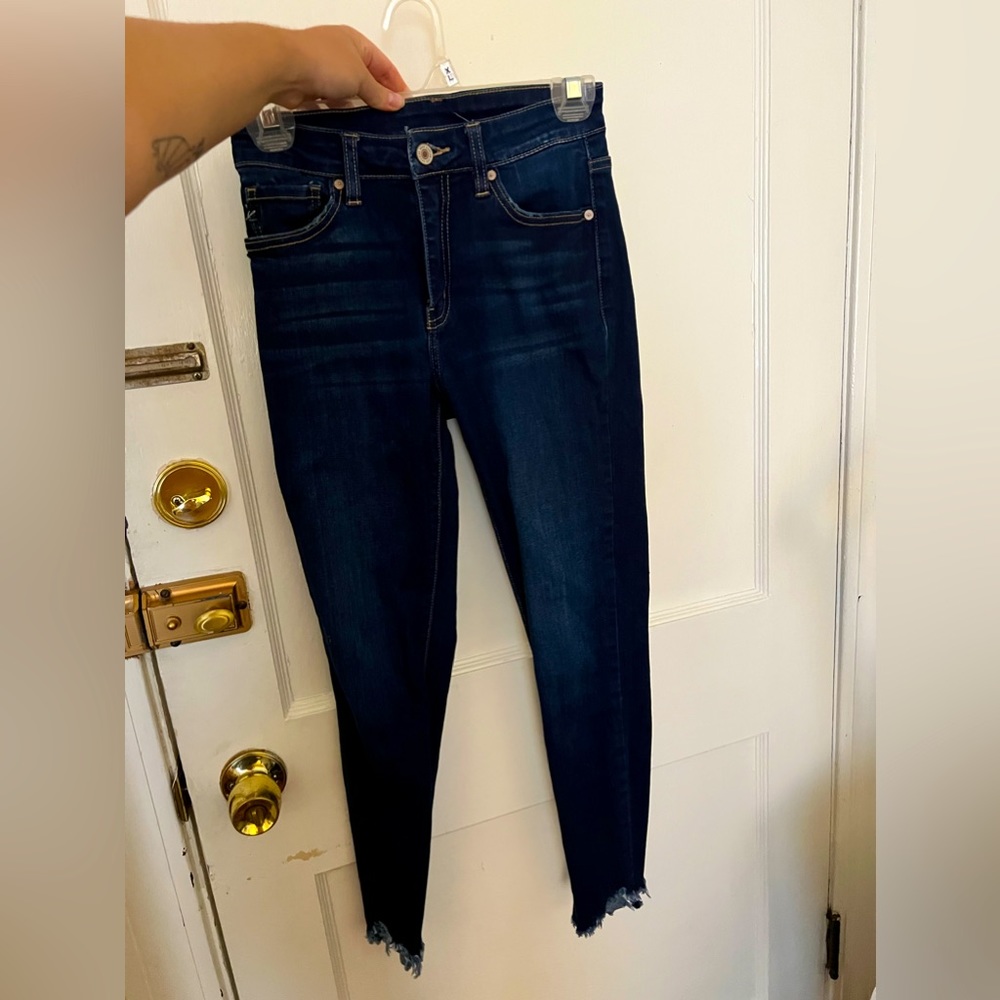 Kancan high rise skinny Jean with with ripped hem. Size 28